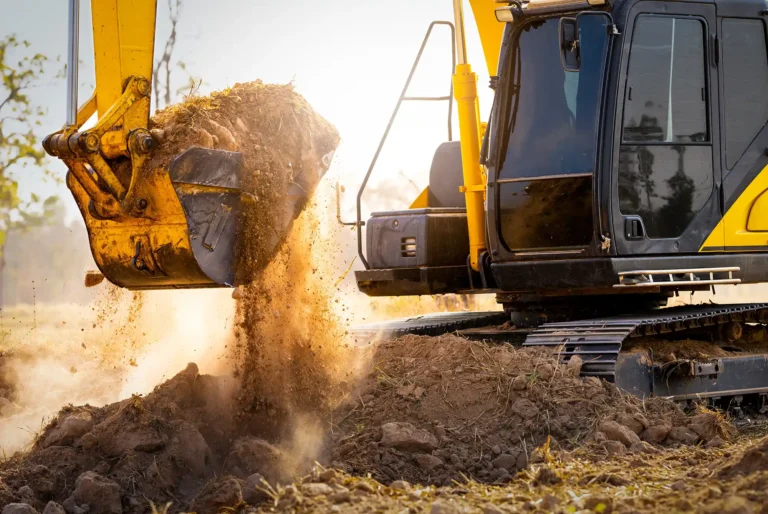 Close-up of excavator at construction site