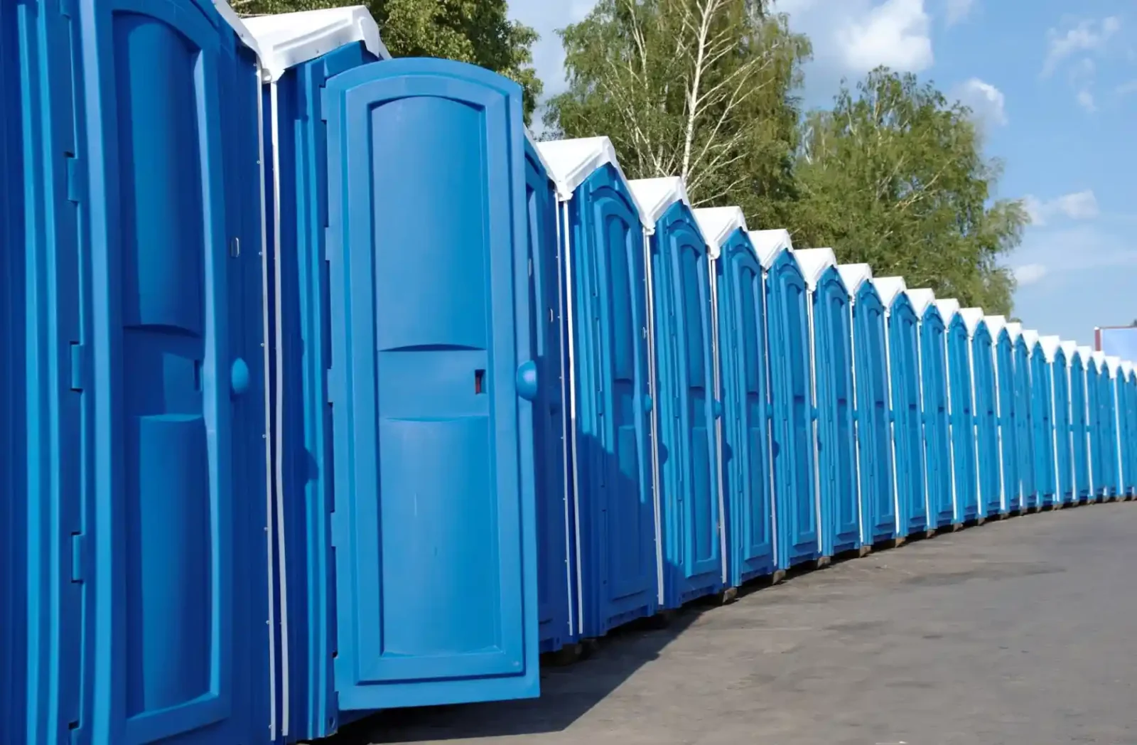 Row of portable toilets at event